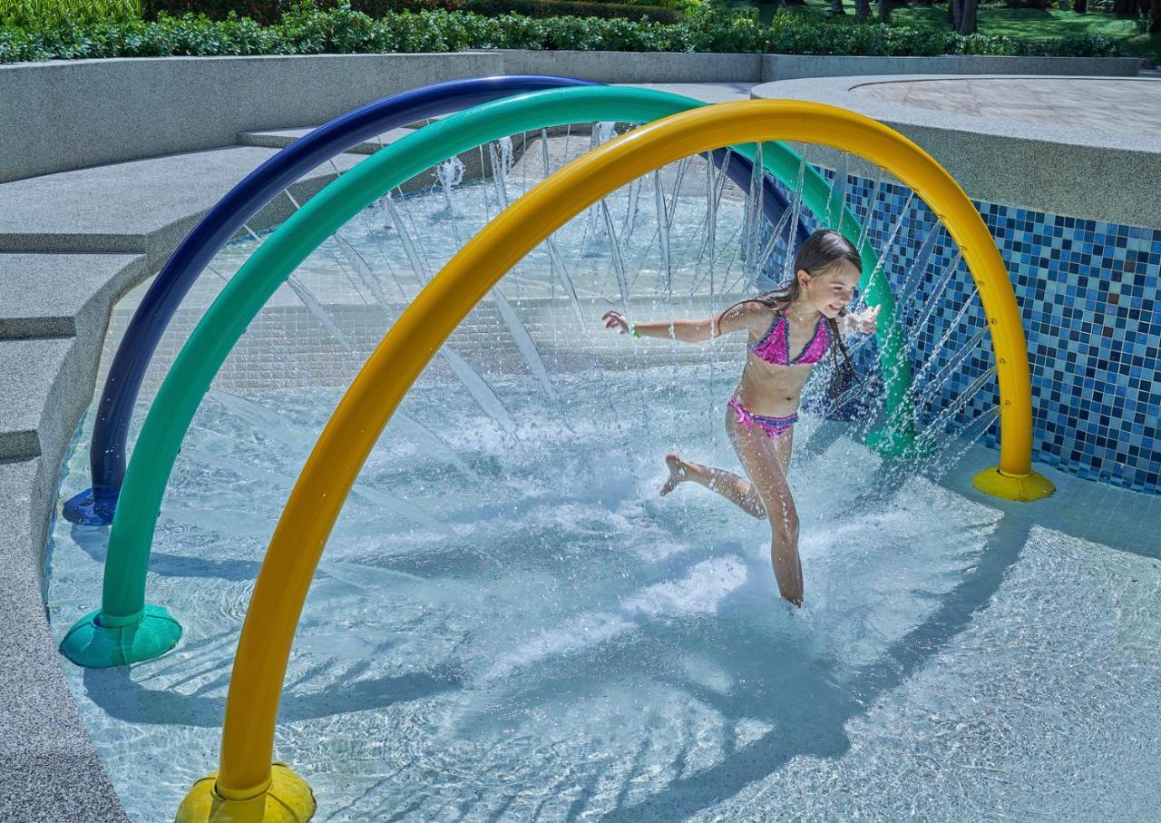 Dusit Thani Laguna Phuket Bang Tao Beach  Esterno foto A girl playing in a water park